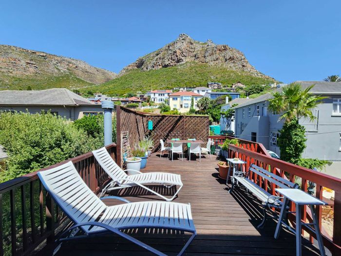 Spacious 3-bedroom apartment in Muizenberg Central with panoramic views, pool, and garage. For Sale.