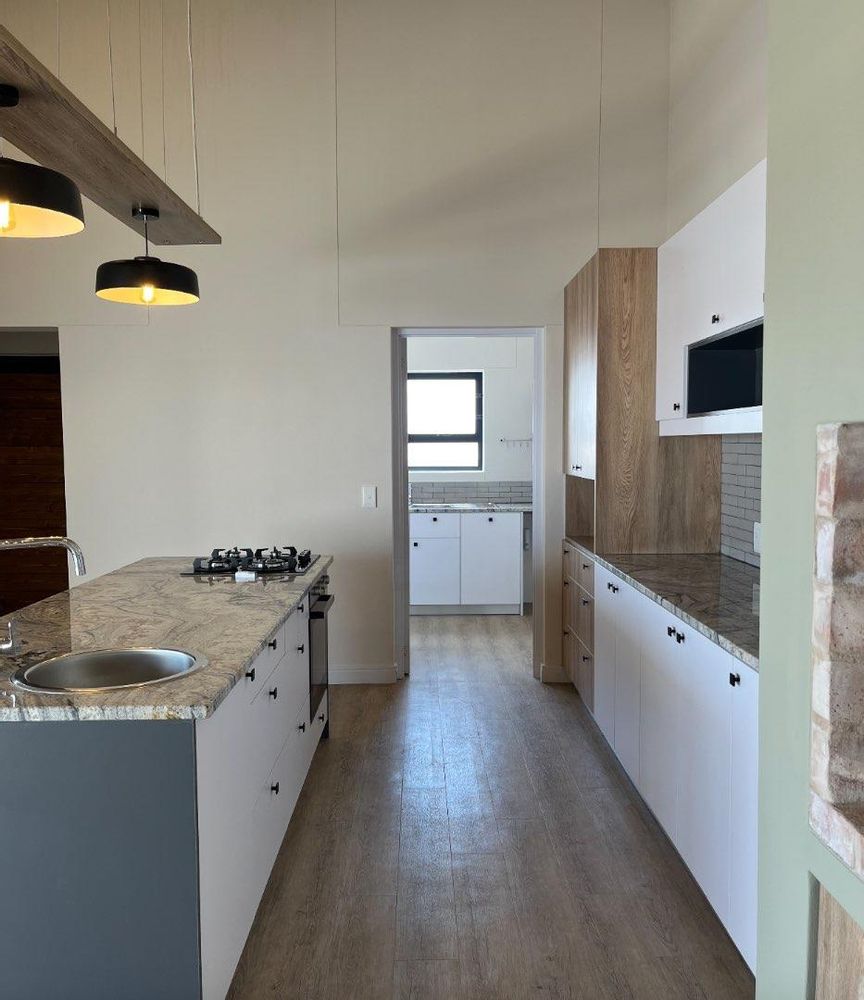 Kitchen with separate scullery.