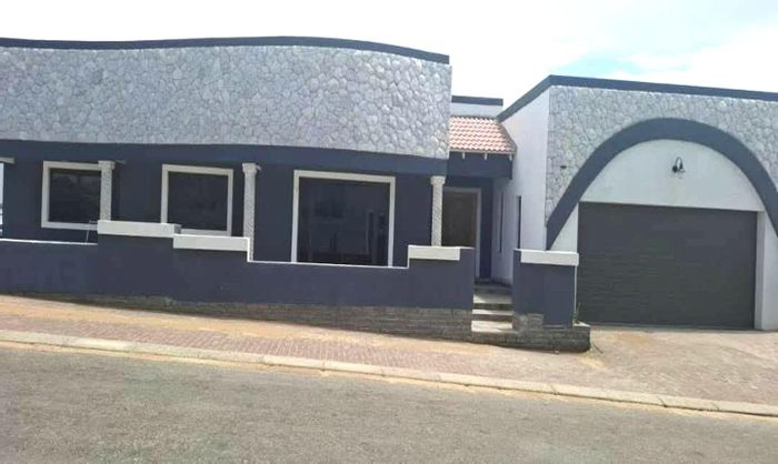 For Sale: House at Dolphin Beach with main house, bachelor flat, and double garage.