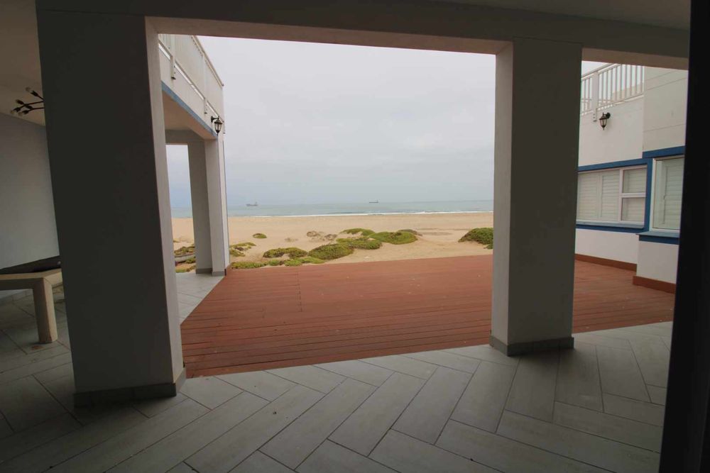 Outside patio with sea view and outdoor BBQ