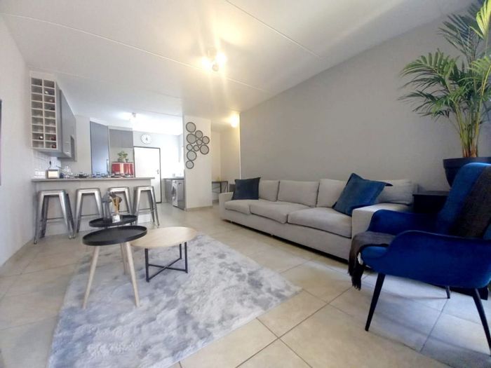 For Sale: Apartment in Strubensvallei with open plan kitchen, balcony, and security.