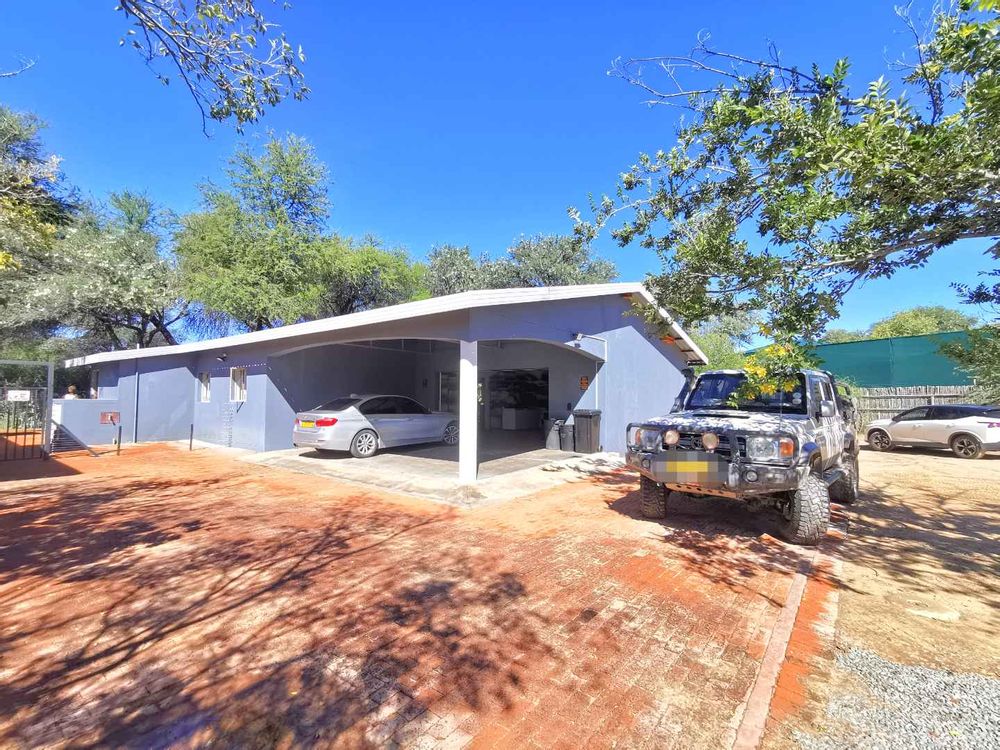 MAIN DWELLING GARAGES AND PARKING SPACE 