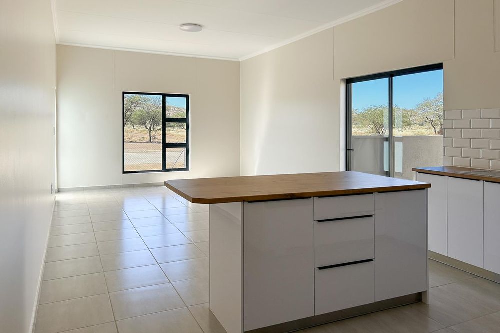 Modern, open-plan living area.