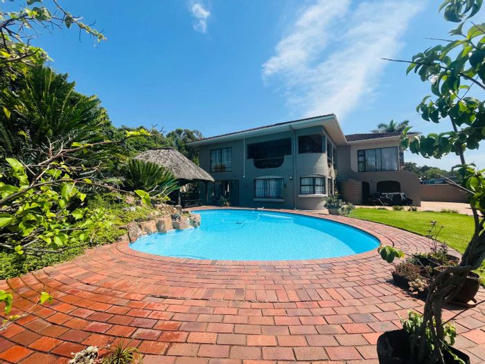 For Sale: Spacious 4-Bedroom House in Umhlanga Rocks Central with Pool and Office.