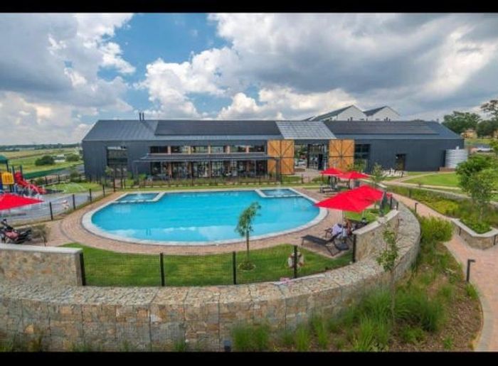 For Sale: Apartment in Modderfontein with pool, gym, and 24-hour security.