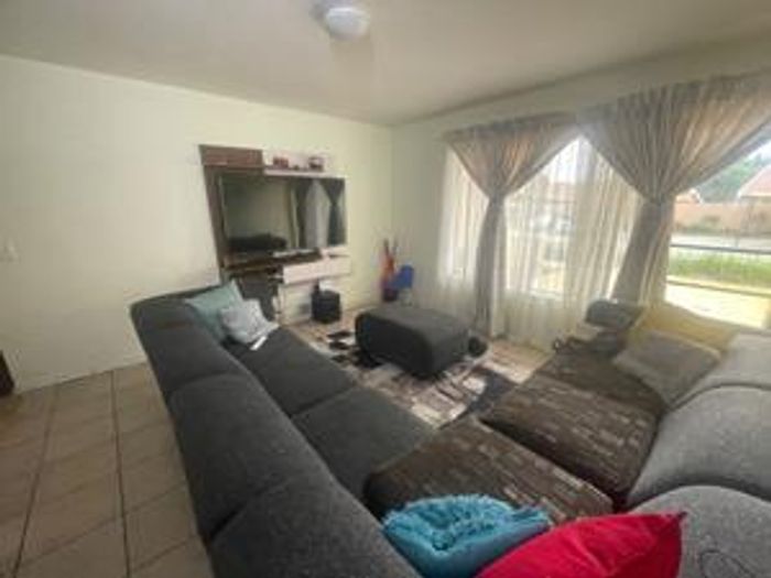 For Sale: Ground Floor Apartment in Esther Park with Pool, Braai Area, and Load Shedding Exemption.