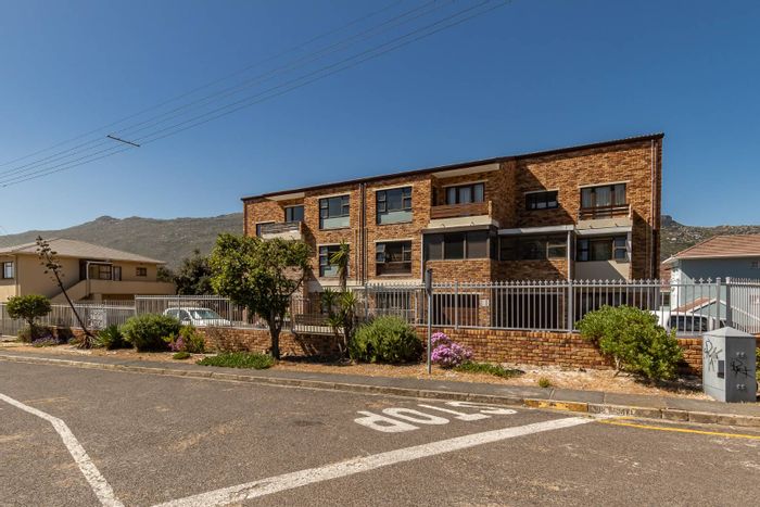 For Sale: Apartment in Fish Hoek Central with off-street parking and unique bath feature.