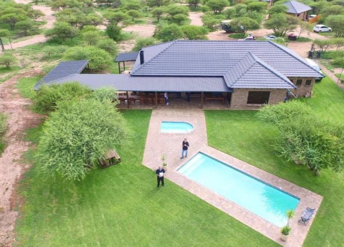 For Sale: Dinokeng Game Farm with chalets, campsites, and conference facilities.