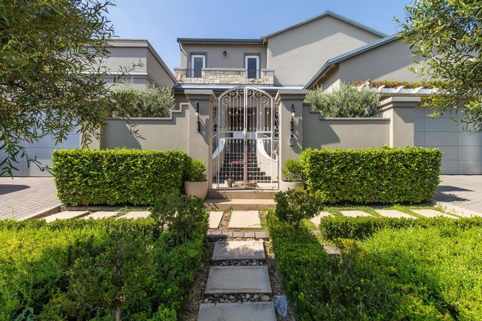 For Sale: House in Waterfall Country Estate with pool, guest suite, and entertainment area.