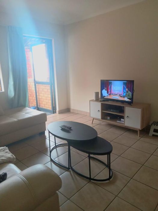 Two-bedroom townhouse for sale in Olifantsvlei with 24/7 security and amenities.