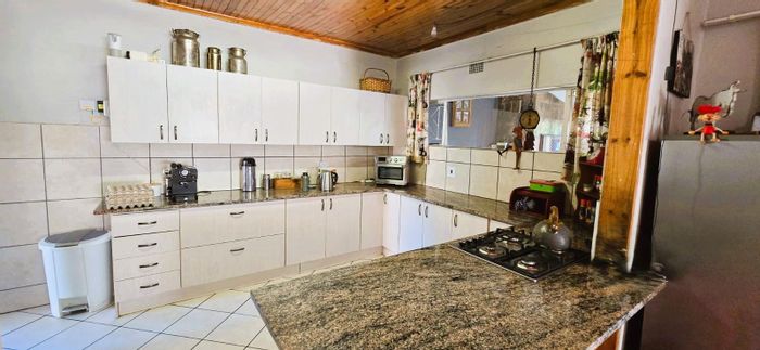 3-Bedroom House in West Acres For Sale with Garden, Double Garage, and Patio.