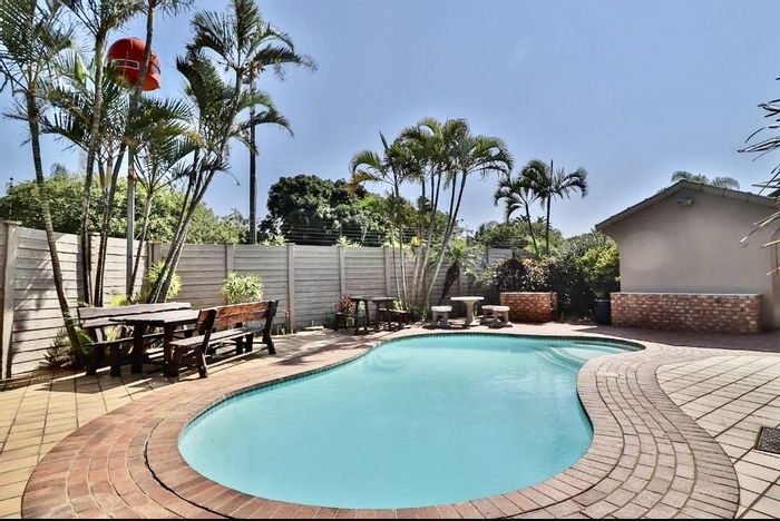 3 Bedroom Townhouse For Sale in Umhlanga Central with pool and entertainment area.