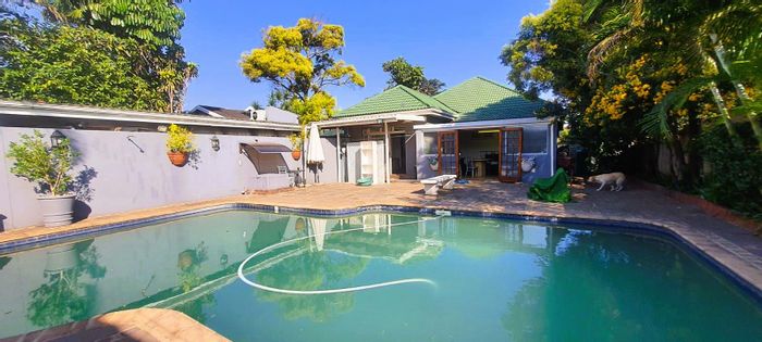 Berea House For Sale: Versatile space with pool, security, and ample parking.
