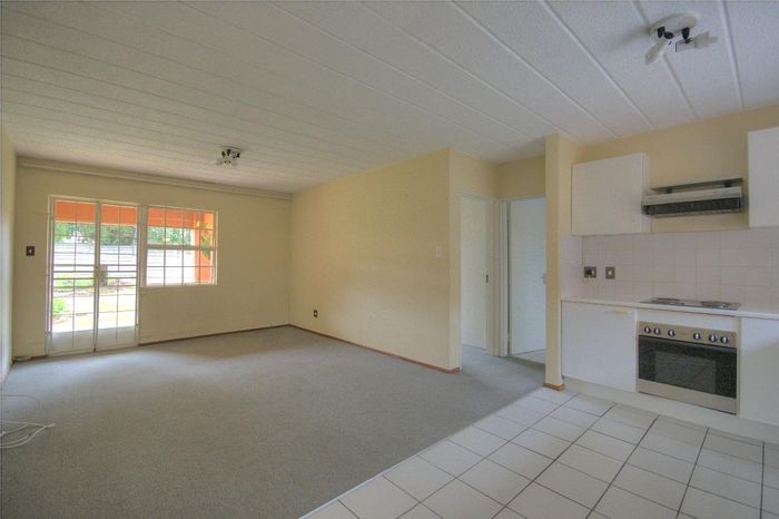 Meyersdal Townhouse For Sale: 1 bed, pool access, secure parking, garden views.