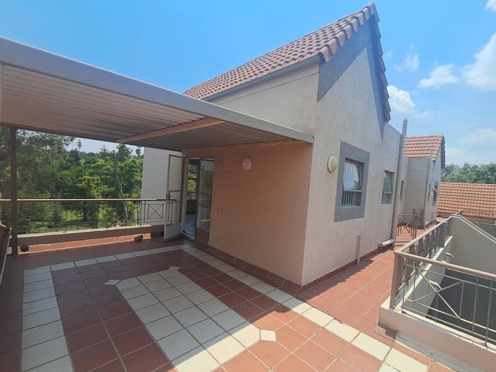 For Sale: Apartment in Midrand Central with 2 bedrooms, modern kitchen, and lounge.