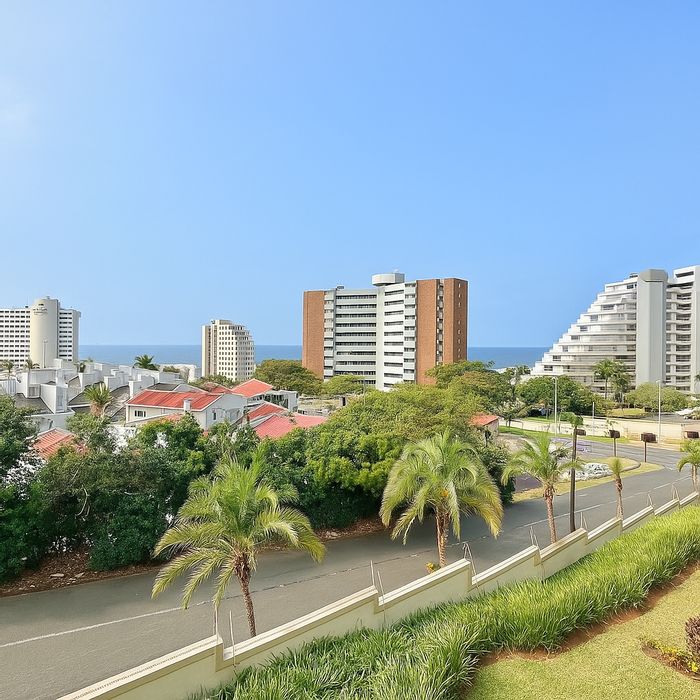 For Sale: Apartment in Umhlanga Central with pool, security, and beach access.