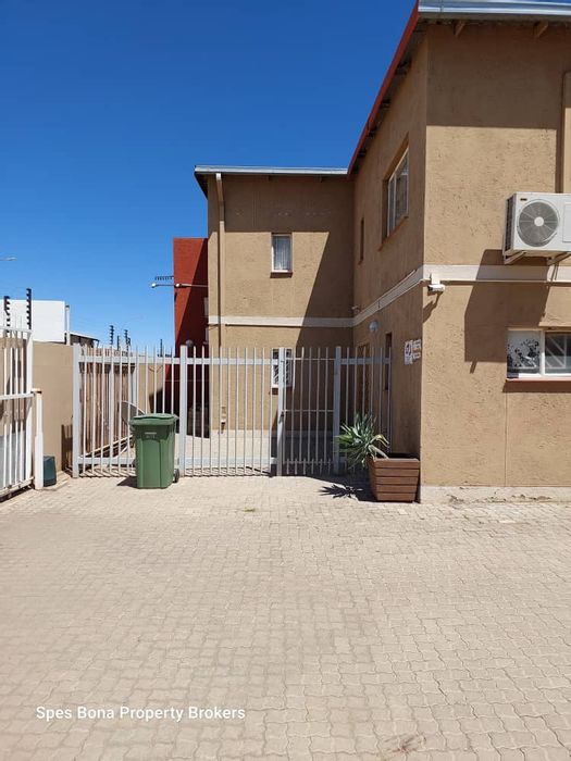 For Sale: Office in Windhoek North with multiple offices, warehouse, and security features.