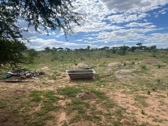 Windhoek South Small Holding For Sale: 8ha plot with water, warehouse, and fencing.