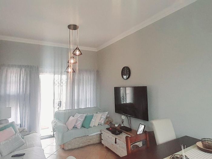For Sale: 2-Bedroom Apartment in Honeypark with balcony and covered parking.