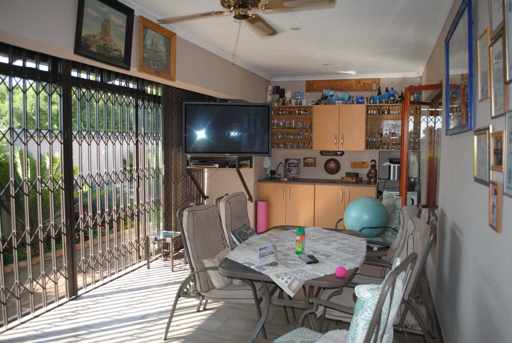 Exit from dinning room onto the patio Braai and Bar entertainment area