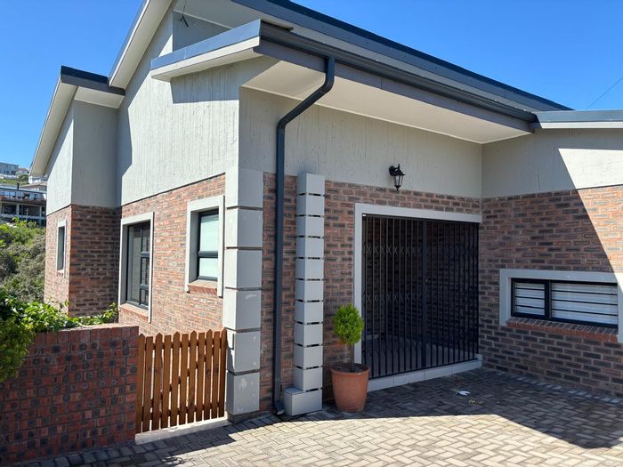 For Sale: Cluster in Dana Bay with 3 beds, double garage, and open living space.