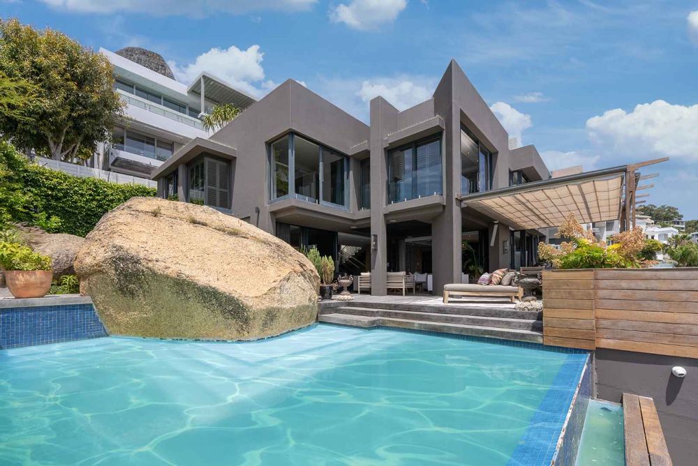 North facing swimming pool, enjoying natural rock feature.