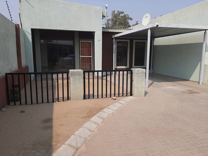 Townhouse for Sale in Okahandja Central: 2 Bedrooms, Storeroom, Close to Amenities.