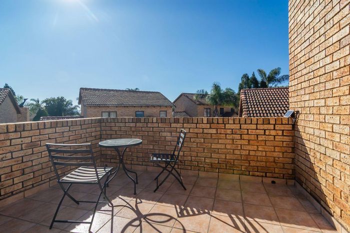 For Sale: Townhouse in Ruimsig AH with pool, inverter, and landscaped garden.