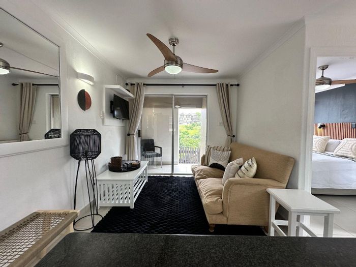 1-Bedroom Apartment for Sale in Compensation Beach, steps from beach and amenities.