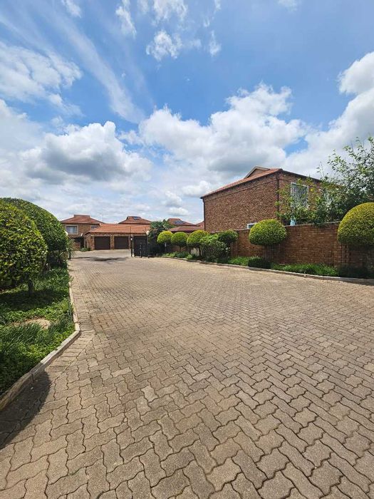 For Sale: Spacious Theresapark Townhouse with garden, braai area, and secure complex.