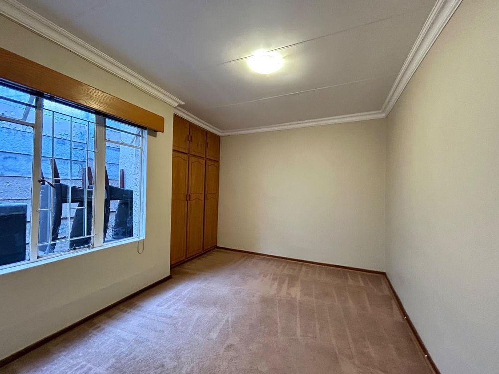 Bedroom of the one-bedroom flat.