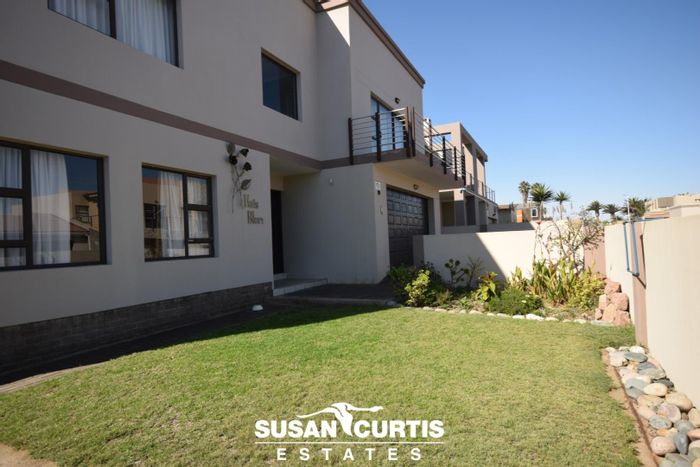 Waterfront House For Sale: 3 Bedrooms, spacious garden, double garage, security features.