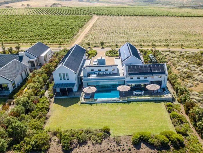 House for Sale at Benguela Cove: Private vineyard, eco-friendly pool, estate amenities.