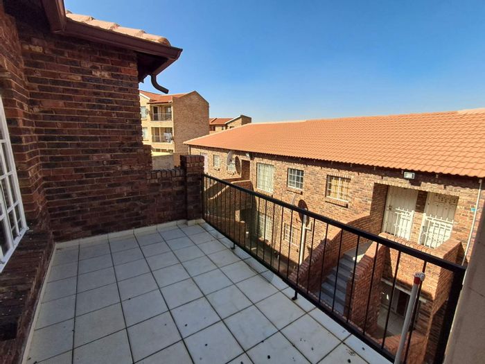For Sale: Townhouse in Winchester Hills with 2 bedrooms, balcony, and parking.