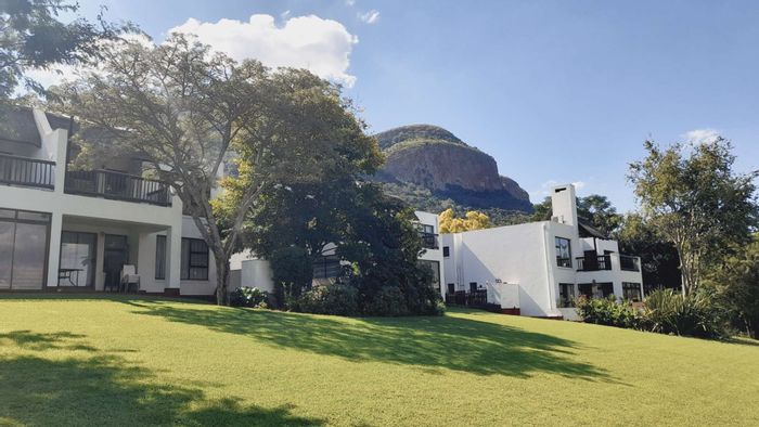 Townhouse For Sale in Kosmos: Pool, tennis court, gardens, and spacious living.