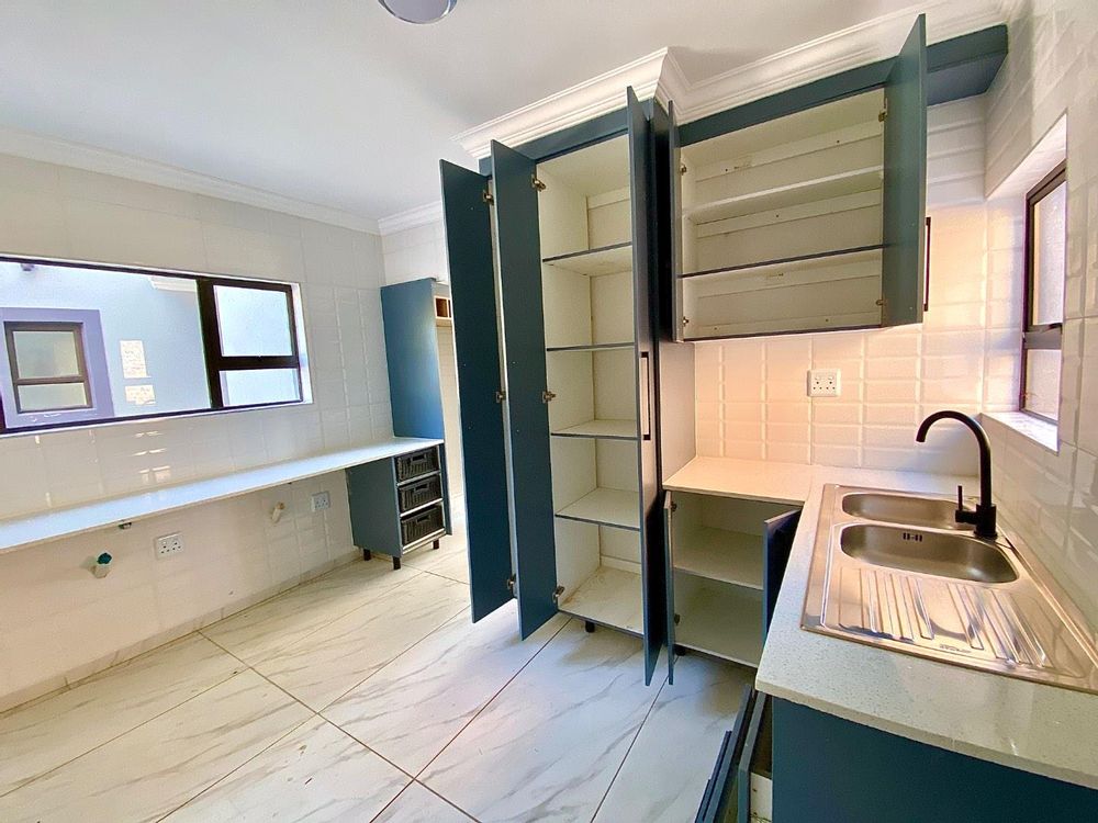 Scullery with full height cabinets 