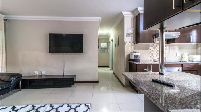3-Bedroom Townhouse in Brackendowns For Sale with Private Garden and Carport.