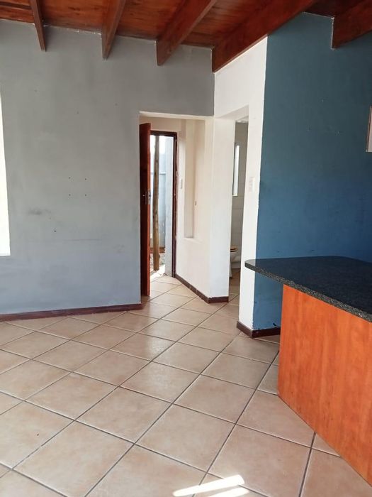 Loft-style townhouse in Pretoria North, to rent, with private courtyard and security features.