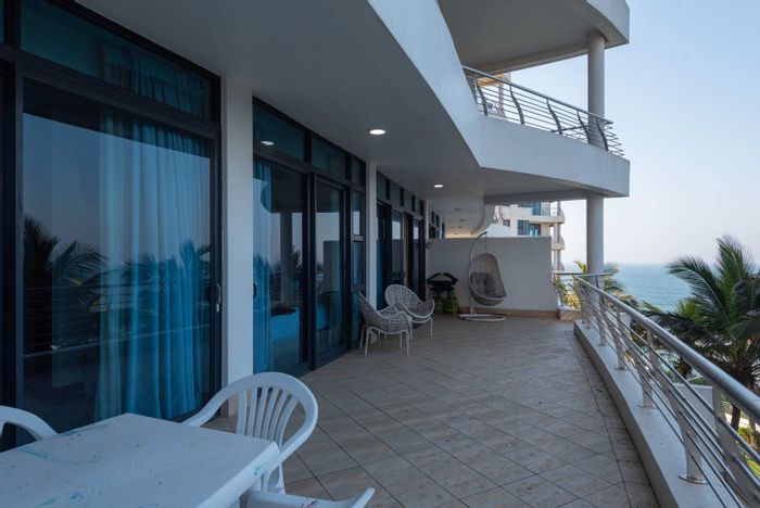 For Sale: Beachfront Apartment in Umhlanga Rocks Central with Sea Views and Amenities.