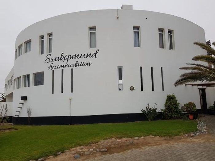 Guest House For Sale in Hage Heights: Eight self-catering units, sea views, braai areas.