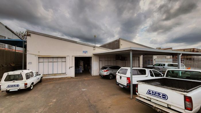 Industrial property for sale in Mountain Ridge with multiple units and ample parking.