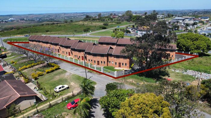 For Sale: Cluster in Stanger Central, 12 units, parking, and development potential.