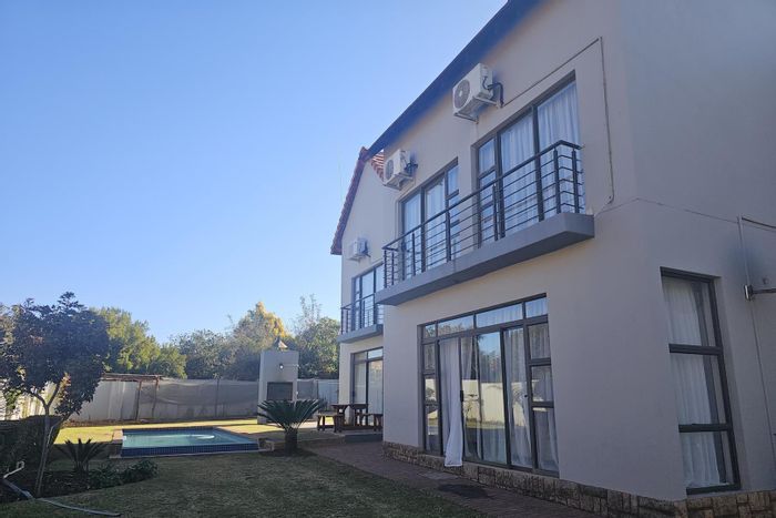 For Sale: House in Hartbeespoort Central with pool, 2 garages, and open-plan living.