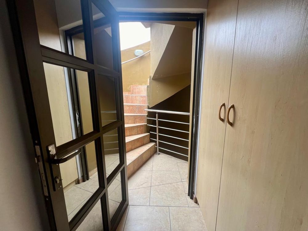 Spiral staircase to the rooftop entertainment area