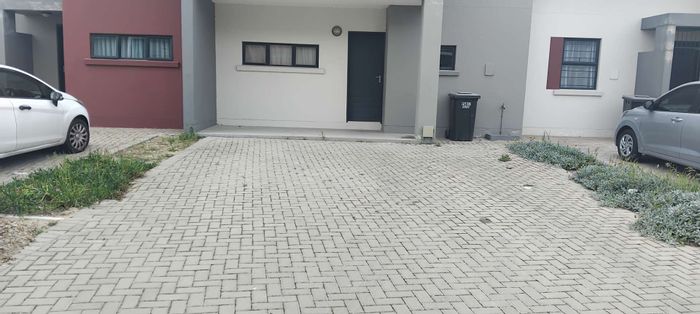 For Sale: Apartment at The Connifers with 2 bedrooms, security features, and backyard.