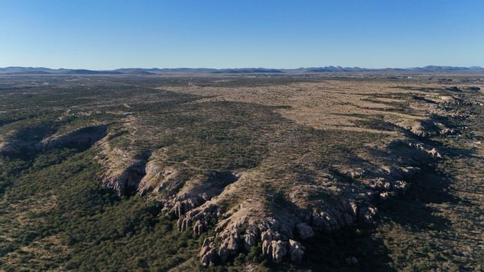 Farm For Sale in Outjo Central: Off-grid living, water supply, and secure fencing.