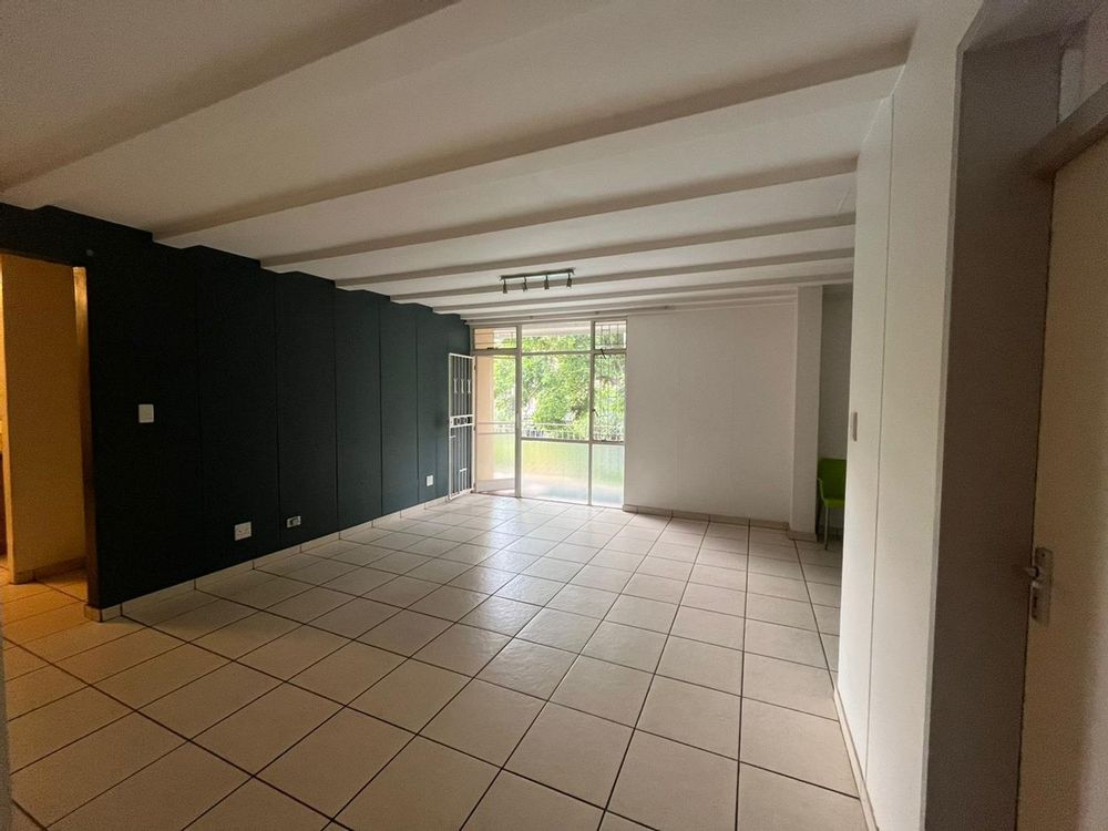 living area with door to balcony