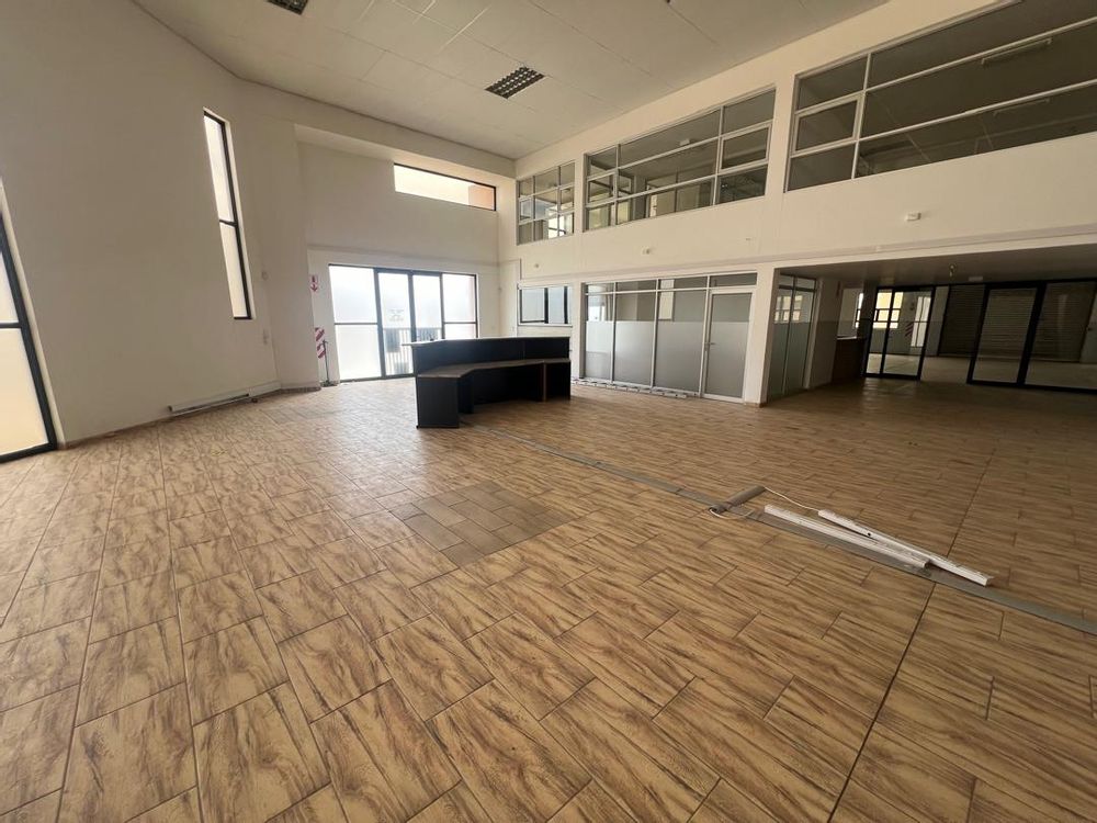 Main entrance reception area, offices and upstairs entertainment area