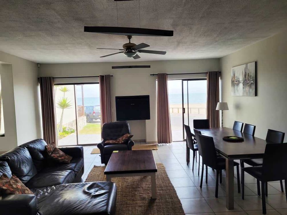 Open plan tv area - dining room and kitchen