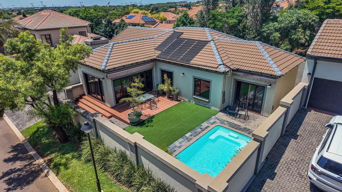 For Sale: House in Midstream Estate with pool, garage, and secure living.